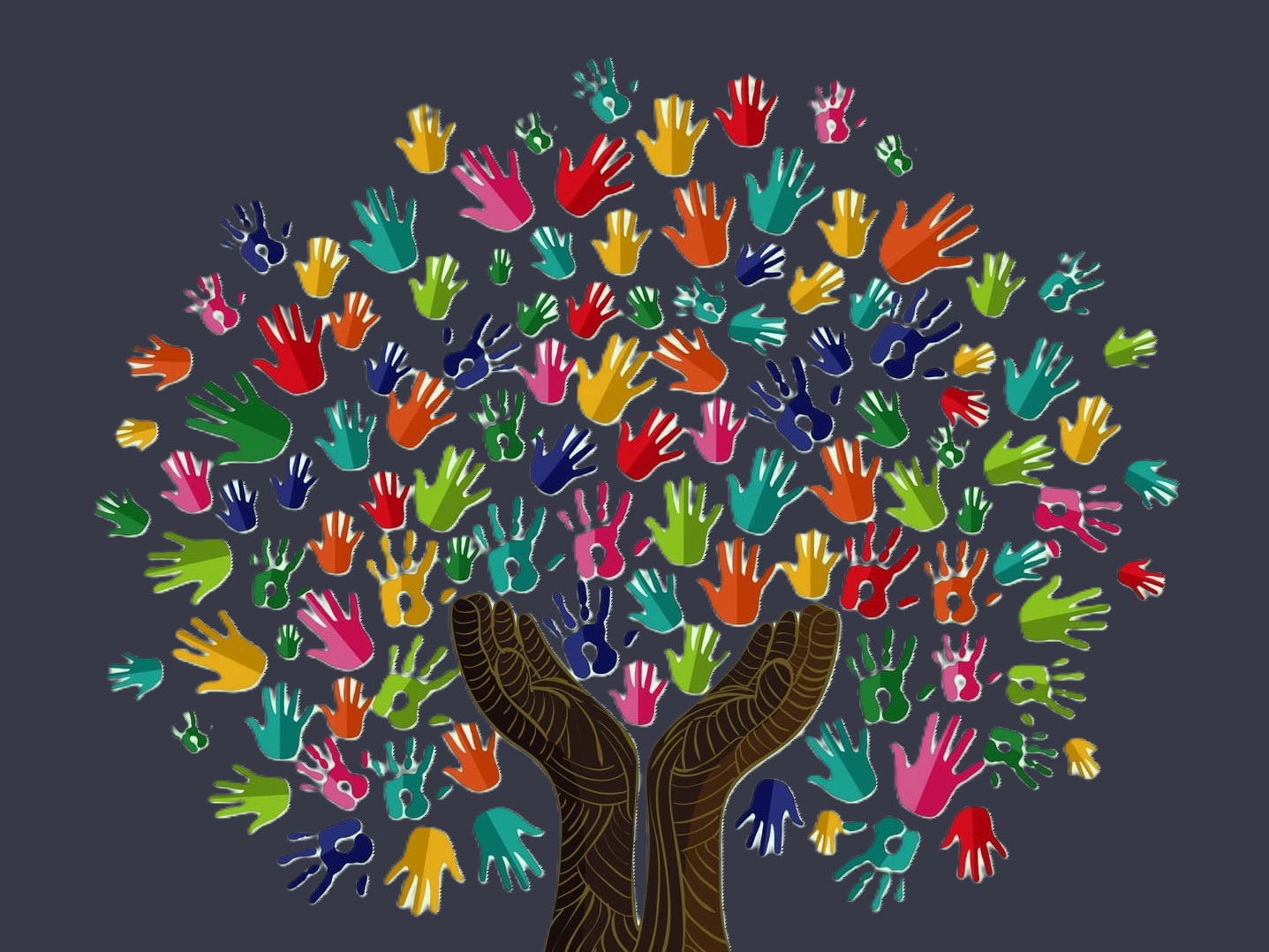 A tree formed from lots of colorful hands